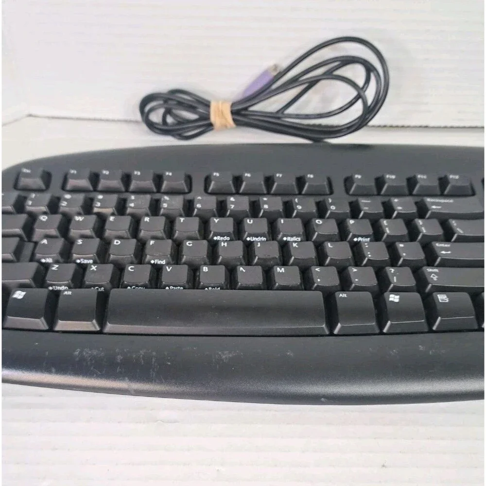Logitech Wired Deluxe Keyboard Y-SU61 Black PS/2 Purple Connector PN 867462-0403